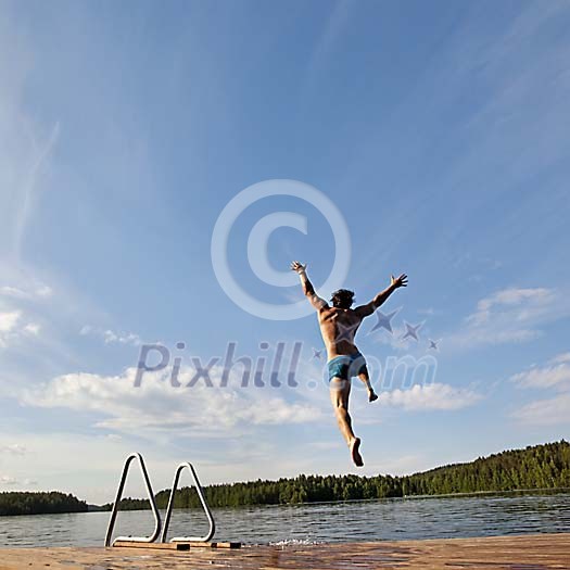 Male diving into the lake