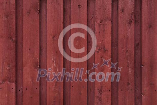 Red cottage wall