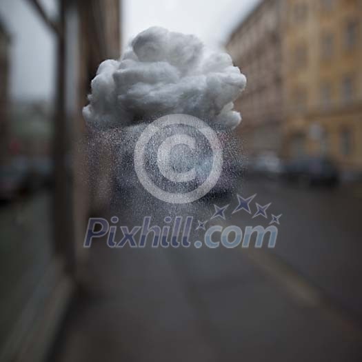 Little cloud hanging in the streets