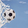 Soccer ball breaks through net