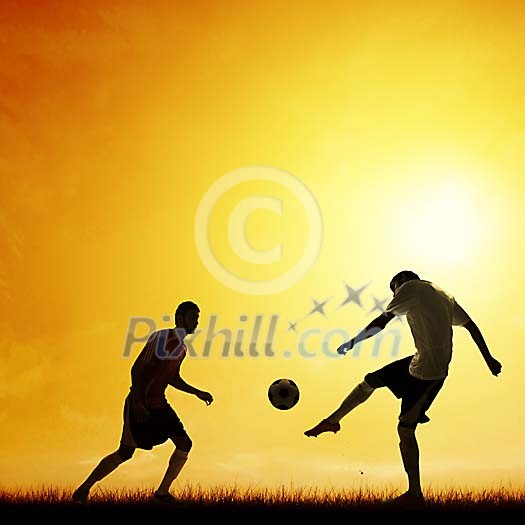 Silhouettes of soccer players.