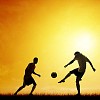 Silhouettes of soccer players.