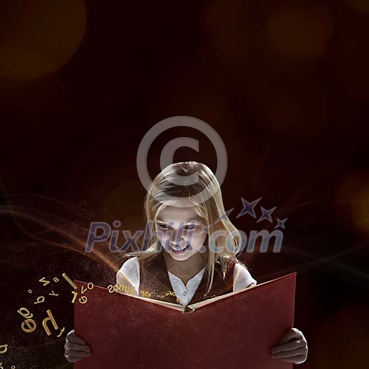 Student girl reading magical book