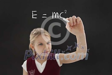 Student girl chalking mass–energy equivalence Student girl chalking mass–energy equivalence