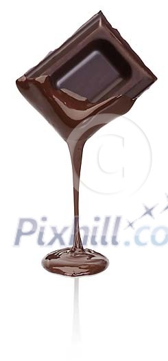 Isolated pure chocolate piece melting