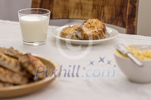 Karelian pasty breakfast with a glass of milk