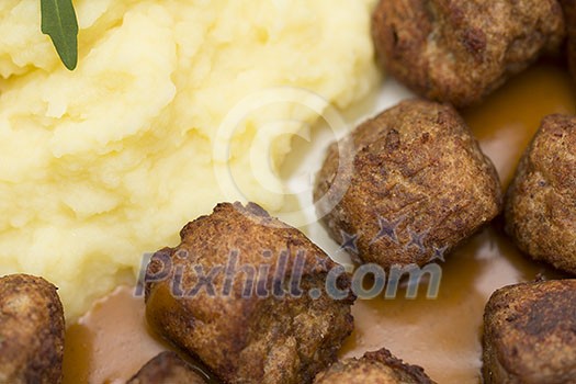 Meatballs with mash potatoes and sauce Meatballs with mash potatoes and sauce