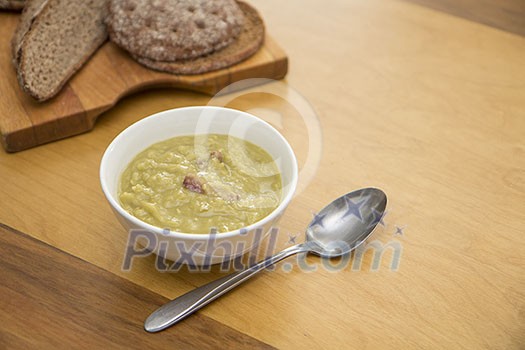 Bowl of pea soup with rye bread Bowl of pea soup with rye bread
