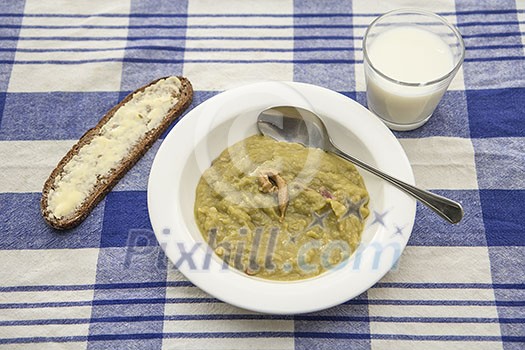 Pea soup with rye bread and a glass of milk Pea soup with rye bread and a glass of milk