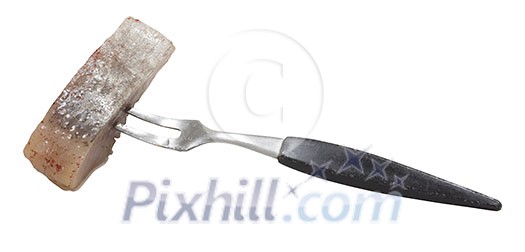 Isolated piece of herring with fork Isolated piece of herring with fork