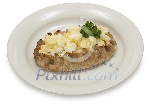 Isolated karelian pasty with egg butter on a plate Isolated karelian pasty with egg butter on a plate