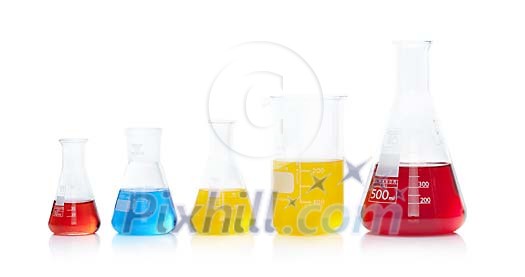 Isolated laboratory bottles in a row Isolated laboratory bottles in a row