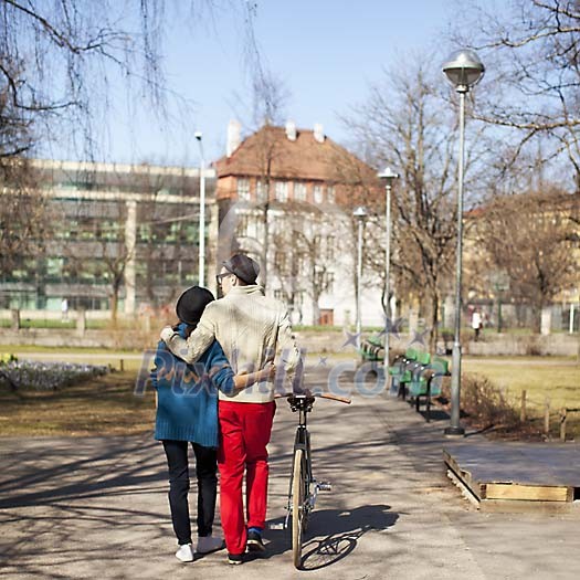 Couple walking in the park Couple walking in the park