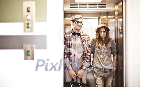 Couple standing in the elevator