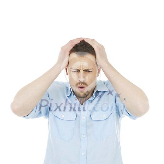 Isolated desperate man holding his head