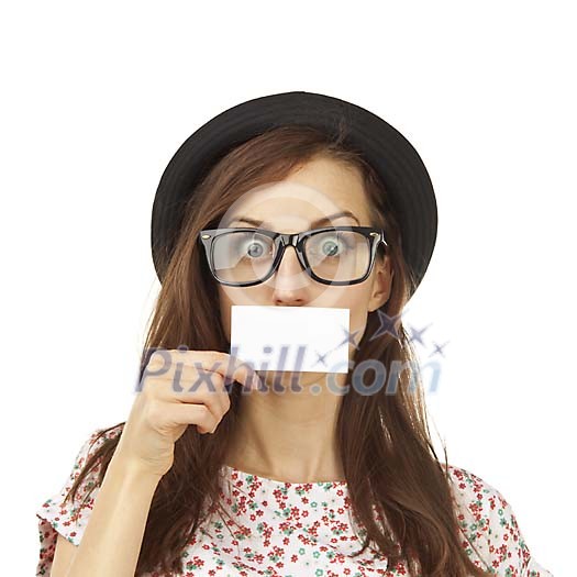 Female covering her mouth with a blank card Female covering her mouth with a blank card