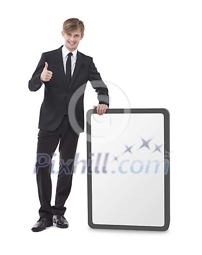 Isolated man standing next to a advertising poster