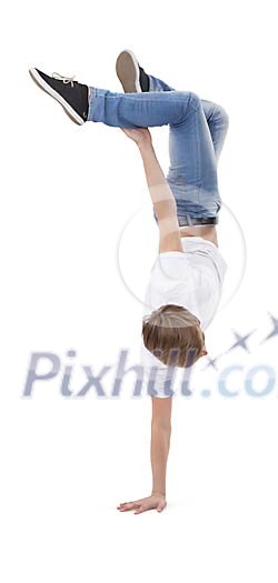 Isolated male dancer standing on his hand