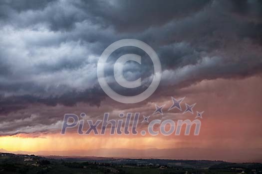 Evening clouds over a small town