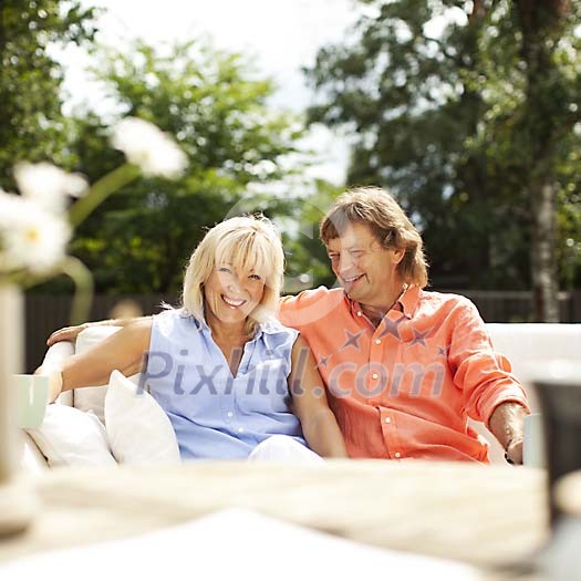 Couple sitting on the terrace Couple sitting on the terrace