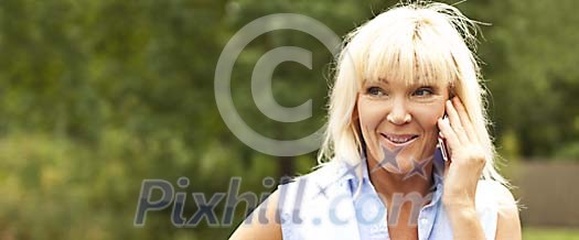 Woman talking on the phone Woman talking on the phone