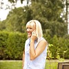 Woman laughing while on the phone