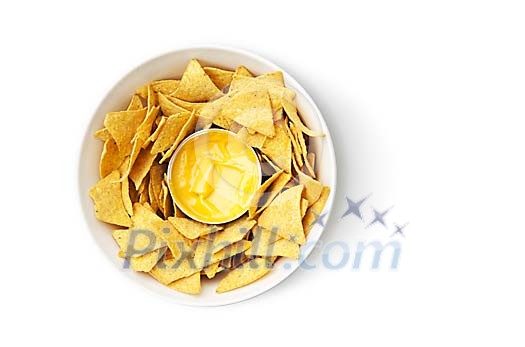 Isolated bowl of nachos with cheese sauce Isolated bowl of nachos with cheese sauce