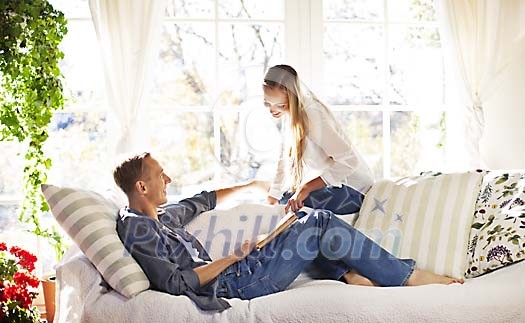 Young couple on the sofa