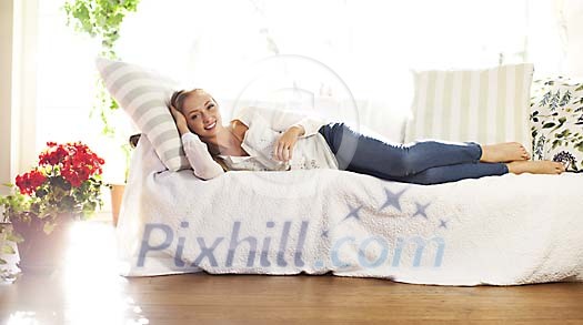 Woman lying on the sofa Woman lying on the sofa