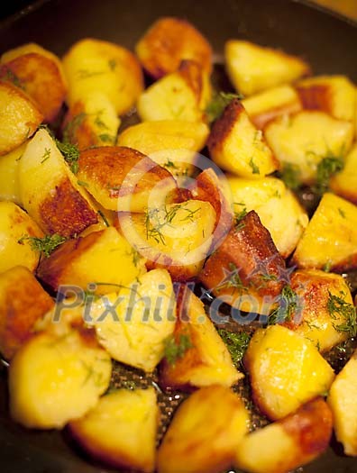 Close-up of golden fried potatoes Close-up of golden fried potatoes