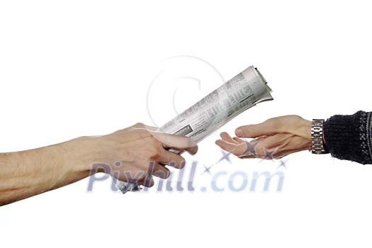 Passing rolled newspaper from hand to hand