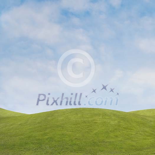 Digital Composite of Green Field and Spring Sky
