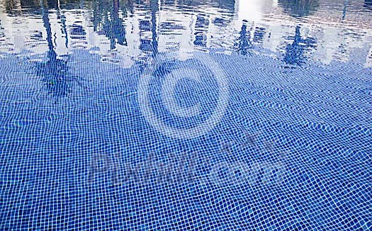 Reflection of Vacation Resort in Swimming Pool Reflection of Vacation Resort in Swimming Pool