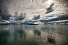 Clouds reflecting on a calm water