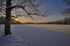 Frozen lake at the sunset