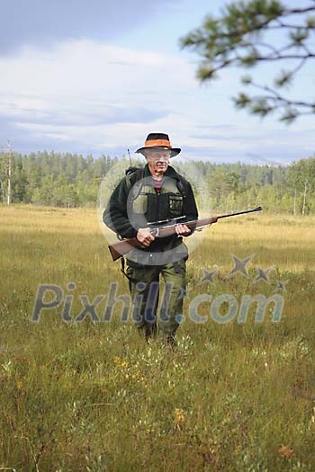 Hunter walking in nature Hunter walking in nature