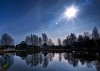 Bright sun on a blue sky - HDR image