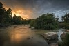 River flowing at the sunset