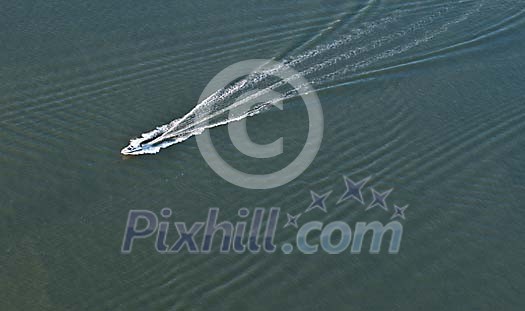 Speeding boat on the sea Speeding boat on the sea