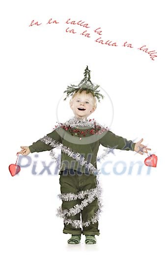 Little boy singing with christmas decoration