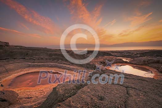 Dead Sea sinkholes at the sunset Dead Sea sinkholes at the sunset