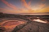 Dead Sea sinkholes at the sunset