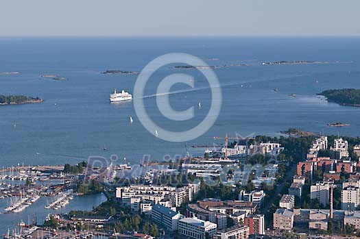 Aerial view of a town next to a sea