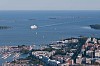 Aerial view of a town next to a sea