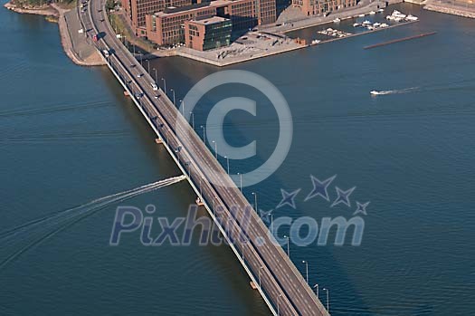 Bridge with traffic over the water from above