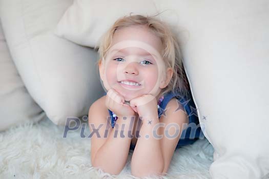 Young girl smiling to the camera