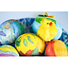 Painted easter eggs with a decorative chick