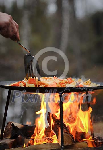 Cooking on the campfire Cooking on the campfire