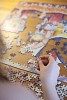 Hands solving a puzzle