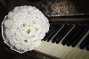 Wedding bouquet on piano keys